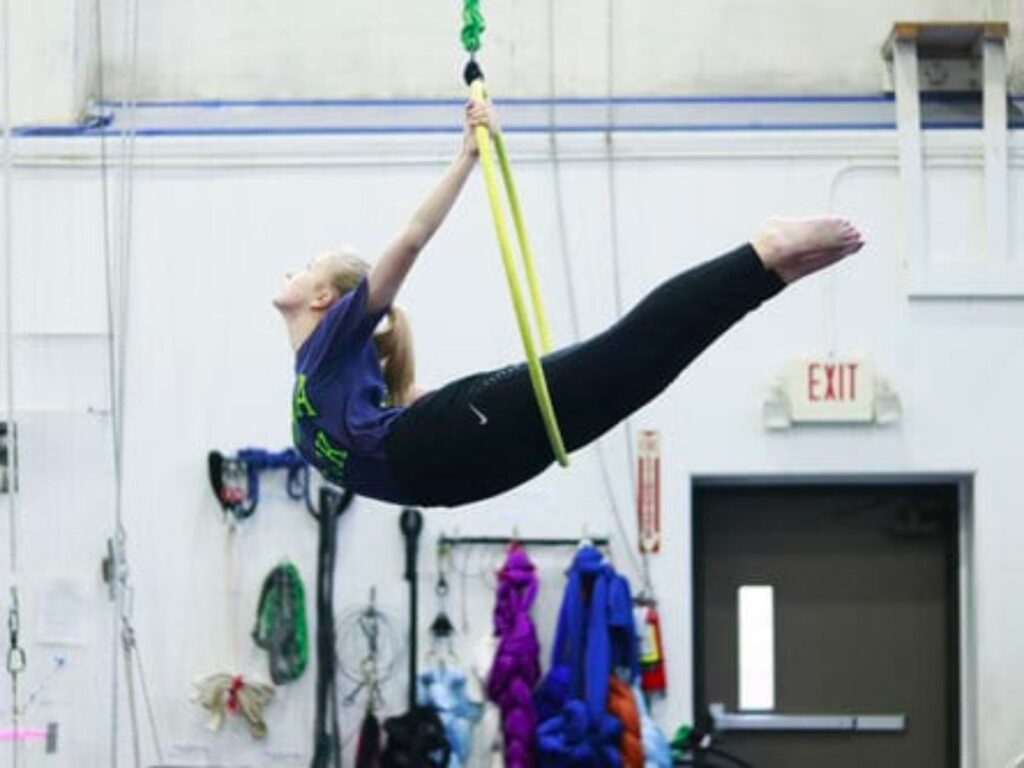 A gymnast in a slackline.